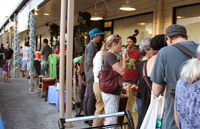 Photo: Customers Shopping at the Down to Earth Night Market