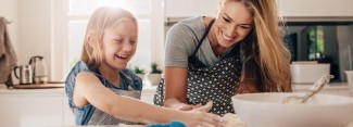 Photo: Mother and daughter baking