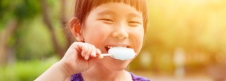 Photo: Girl Eating a Popsicle
