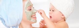 Family beauty treatment in bathroom. mother and daughter