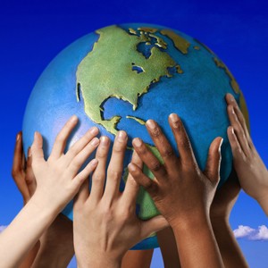 Photo: Hands Holding a Globe
