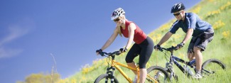 Photo: Couple on Mountain Bikes