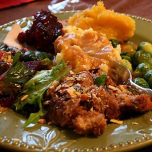Photo: Plate with Stuffing, Salad, Squash and Cranberry Sauce