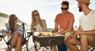 Photo: People Grilling at the Beach