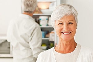 Photo: Older Woman Smiling in the Kitchen