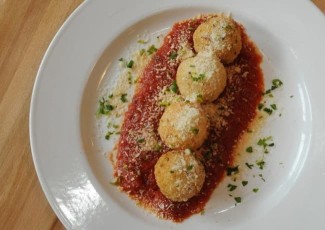 Photo: Baked Risotto Balls (Arancini Di Roso)