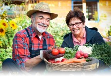 Photo: Couple with Fresh Garden Vegetables
