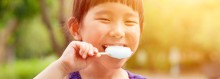 Photo: Girl Eating a Popsicle