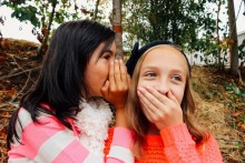 Girls whispering Girls whispering