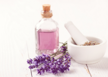 Photo: Lavendar Essential Oil with Lavendar Buds with a Mortar and Pestle