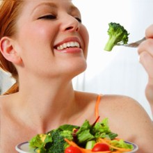 Photo: Woman Eating a Fresh Salad