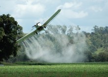 Photo: Airplane Spraying Pesticides