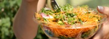 Photo: Person Eating a Fresh Salad